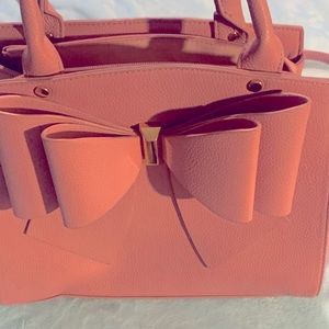 crossi pink bow handbag, new